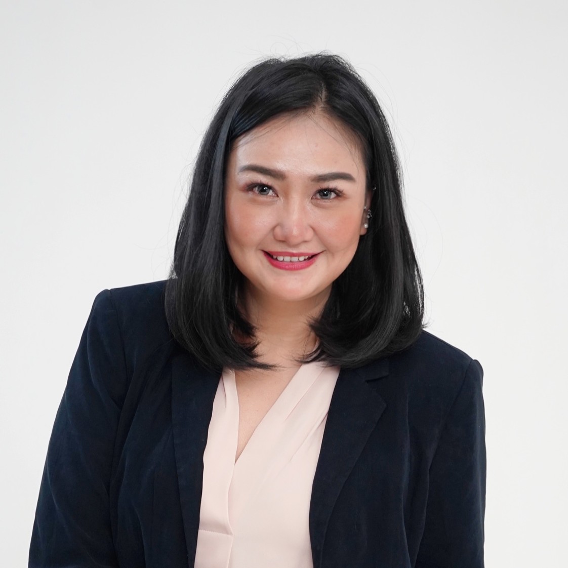 Inne Nathalia, S.Sos., M.I.Kom.