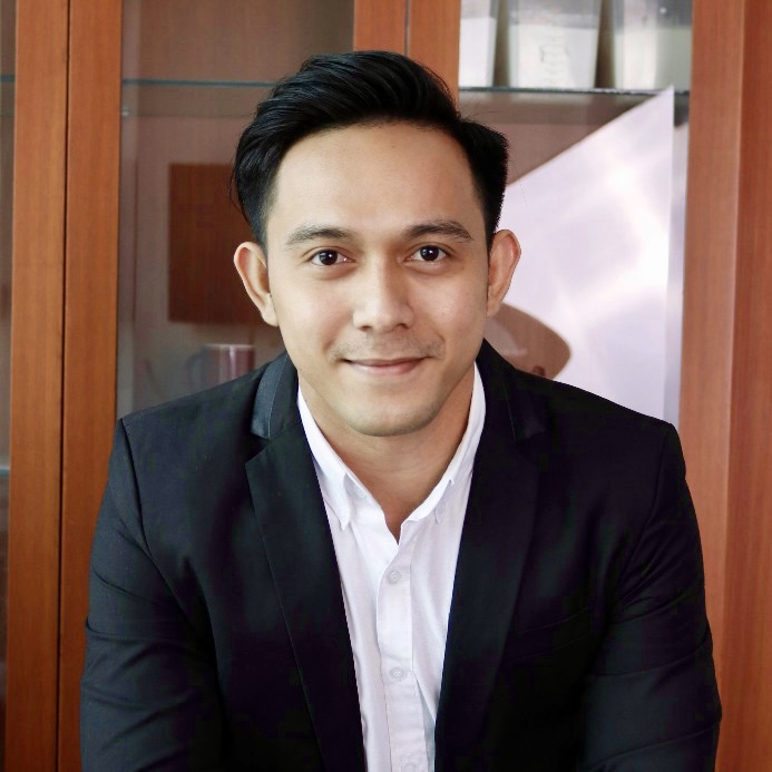 Muhamad Rizki, S.I.Kom., M.I.Kom. 